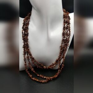 Coco nut beaded mocha triple layered necklace. N206
